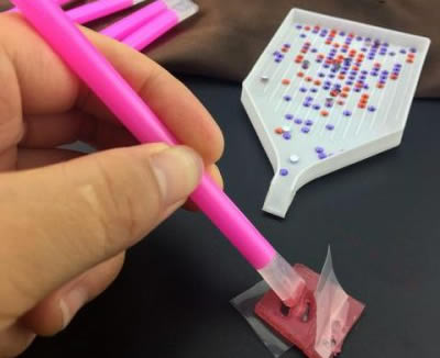 Apply Wax To The Diamond Pen