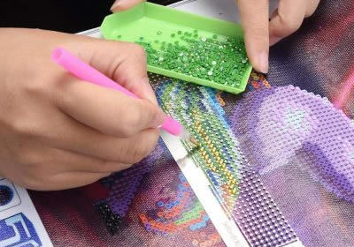 Carefully Press The Diamond Onto Its Corresponding Symbol On The Canvas